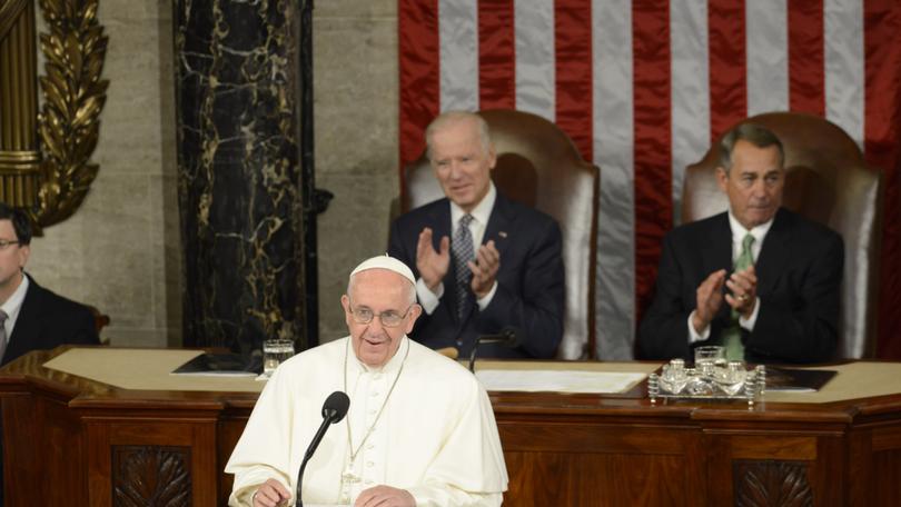 Francis speaks to a joint meeting of Congress in the House chamber in Washington on Sept. 24, 2015. Behind him sit Vice President Joe Biden and House Speaker John A. Boehner (R-Ohio), who are Catholic. MUST CREDIT: Melina Mara/The Washington Post