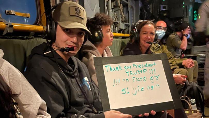Edan Alexander was returned safely and held up a sign thanking Donald Trump.